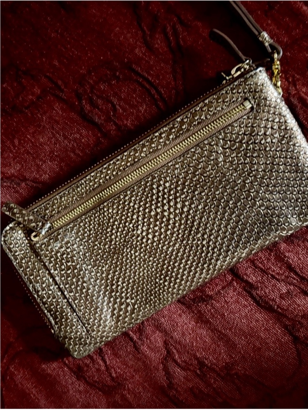 Lodis snakeskin embossed wristlet wallet bag